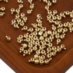Crimp beads, with 0.8mm hole, gold-plated sterling silver
